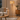 Natural Tripod Floor Lamp beside sofa or reading chair