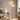 Gold Globe Tree Floor Lamp beside sofa or armchair