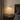 Gold cordless table lamp on a nightstand, lamp on