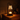 Matte black candle warmer on a quiet dresser, moody amber light