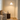 Brass Ring Arc Floor Lamp in living room corner