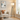 Black Brass Tripod Floor Lamp in living room corner