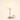 Nickel glass table lamp next to a book for scale, shade on