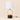 Wood ring table lamp with 21 inch height and 10 inch width overlays, lamp off