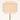 Close-up of the three-tier cream linen shade and gold pull chain, lit