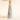 Close-up of the tapered white marble cone base, gold collar, and white cord