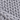 Close-up of the thick stitches on the grey chunky knit weighted blanket