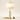Stacked marble table lamp with a book and ceramic cup for scale, lamp on
