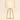 Bronze tripod table lamp with a marble-pattern drum shade, lamp on