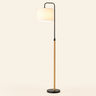 Wood Arc Floor Lamp lit cream studio packshot, black metal and natural wood
