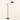 Black Gold Balance Floor Lamp lit cream studio packshot