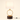 Dark wood cylinder with a vertical gold ring and a white fabric drum shade, lamp on