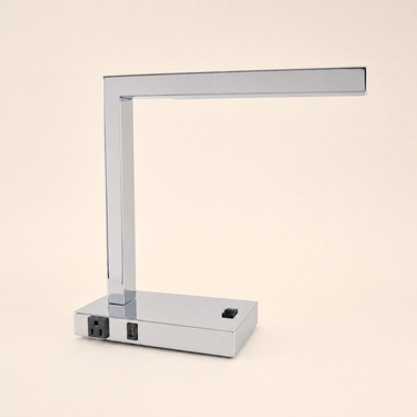 Polished chrome L-shaped LED desk lamp with unlit underside LED strip, lamp off