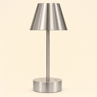 Small brushed-nickel cordless table lamp with a metal cone shade, lamp off