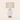 Ribbed glass table lamp with a beige linen drum on a clear ribbed egg base, lamp off