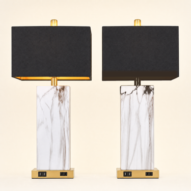 Pair of faux-marble table lamps, left lamp on and right lamp fully off