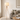 Natural Wood Three-Leg Floor Lamp beside sofa