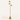 Three-quarter view of the brass triple-spot tree floor lamp, lit