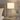 Nickel glass table lamp on a quiet nightstand, shade on