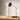 Black marble desk lamp on a quiet wood desk, shade on