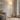 Marble wood floor lamp in a quiet living-room corner, lit