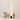 Brass Column Floor Lamp scale beside chair