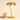 Gold pull-chain table lamp next to a book for scale, shade on