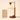Wood crane arm table lamp next to a mug for scale, shade on