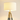 Black Brass Tripod Floor Lamp white drum shade and brass neck closeup