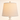 Close-up of the oatmeal linen shade and round whitewashed finial, lamp on