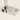 Closeup of the chrome base with one AC outlet, one USB-A port, and a black rocker switch