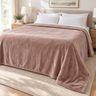 Taupe king heated blanket spread across a made bed