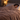 Woman asleep under the taupe king heated blanket